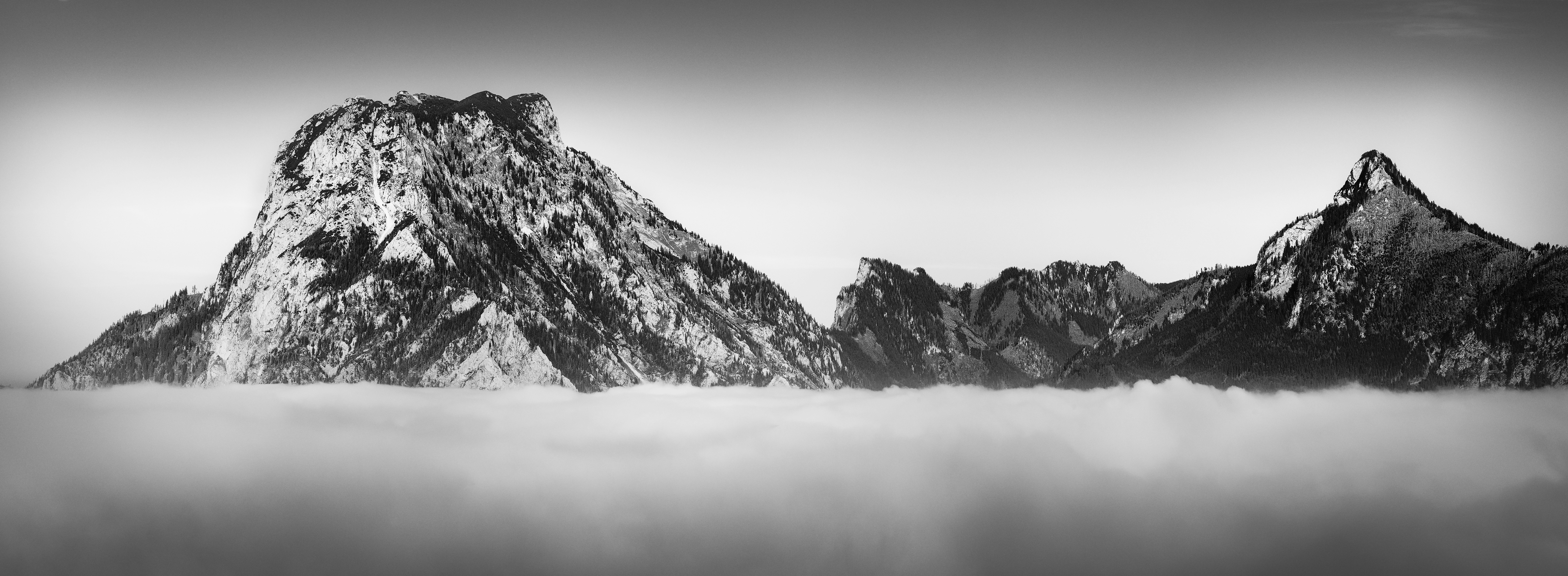 mountain range above clouds